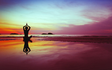 healthy life concept, beautiful yoga silhouette at sunset