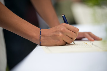 signatures during a wedding ceremony