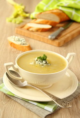 Homemade onion soup with celery and blue cheese