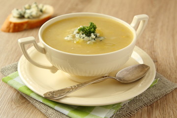 Homemade onion soup with celery and blue cheese