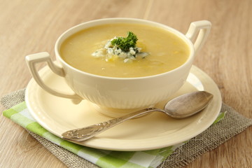 Homemade onion soup with celery and blue cheese