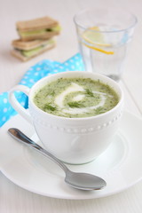 Cold cucumber soup with dill, yogurt  and sandwiches