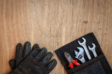 Closeup of assorted work tools on wood