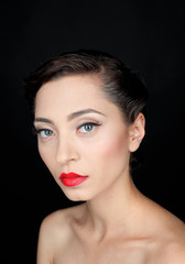 portrait of a beautiful serious woman with red lips