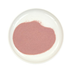 Raspberry gelatin granules in a small dish