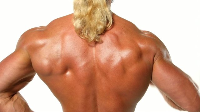 Very muscular back guy on white background