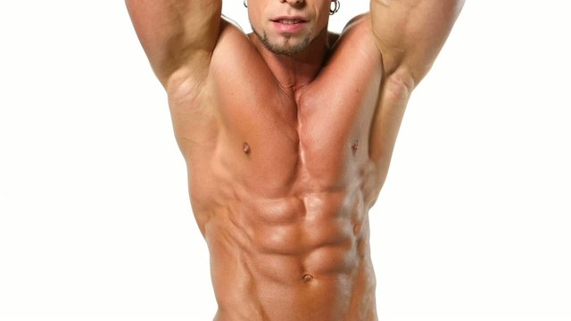Muscular and sexy torso of young man, bodybulider isolatedon