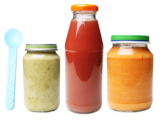 jars of food and bottle of juice for babies