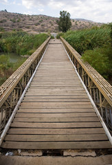 Old bridge across river Jordan
