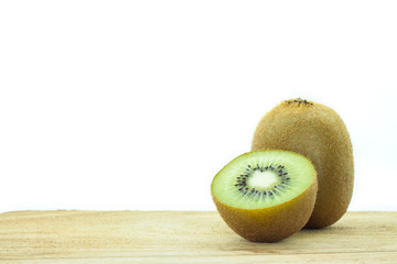 kiwi fruit on wooden ground  isolated on white background