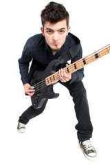 Focused bass player in black