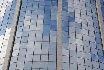 Fototapeta na wymiar Sky Reflection in hotel building glass