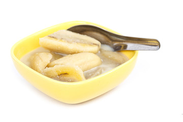 Thai dessert, Banana in coconut milk sprinkle with sesame