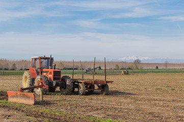 Obraz premium Agricultural Landscape with farm tools