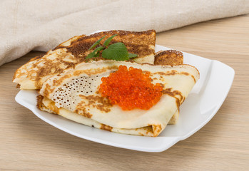 Pancakes with red caviar