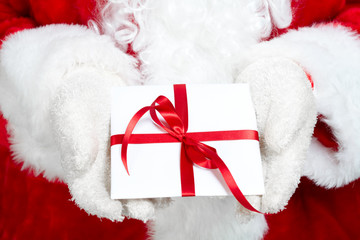 Obraz na płótnie Canvas Christmas Santa Claus with gift