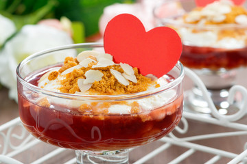 dessert with berry jam, whipped cream for Valentine's Day