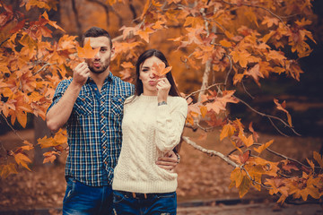 Young couple in autumn park