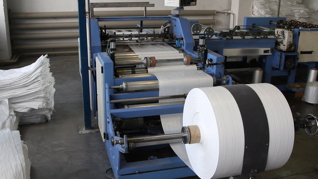 Big polymeric tape roll unreel for a printing press
