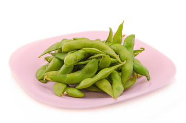 Green soybeans on white background