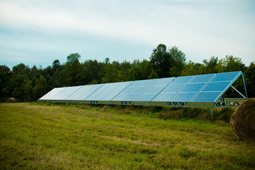 Solar energy panels in a farmer's field