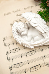 little lovely sleeping angel with christmas decoration