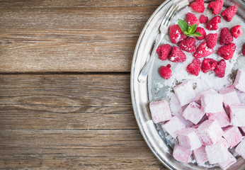 Homemade raspberry marshmallow with fresh raspberries and sugar