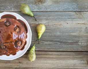 Pear, ginger and honey cake with creamy caramel topping and fres