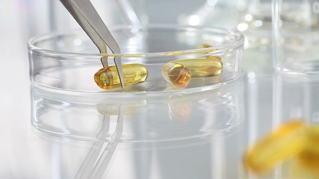 vitamins supplements pills omega 3 on table  