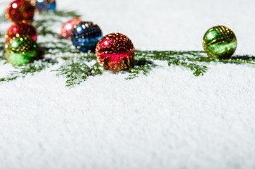 Group of Christmas ornaments in the snow