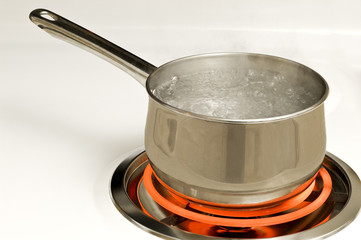 Pan of Boiling Water On Hot Burner