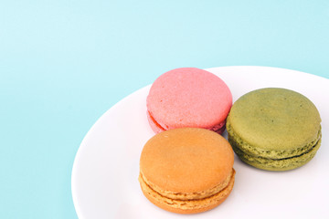 Tasty colorful macaroon on a plate