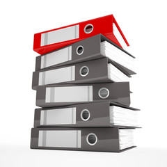 A pile of office ring binders