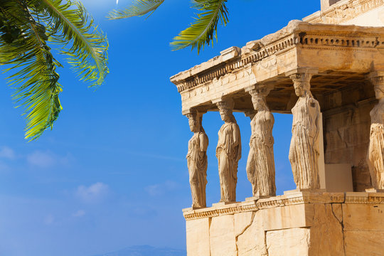 Beautiful view of Erechtheion with palm in Athens