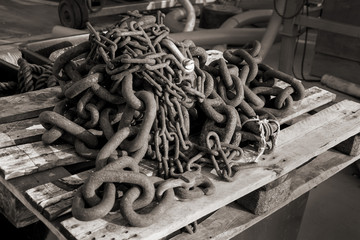chain rusted at small fish-harbour
