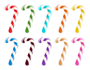 Set of colorful candy canes on white background.