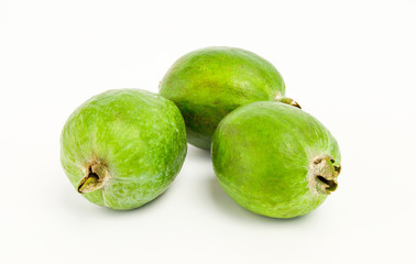 Three feijoa on white background