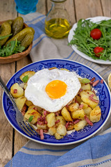 Roasted potatoes with bacon and eggs