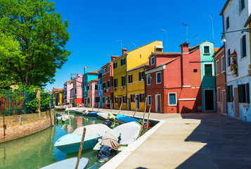 Fototapeta na wymiar Canal and colorful buildings in Burano island, Venice, Italy