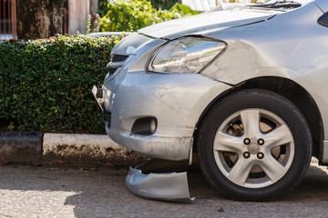 Body of blue car get damaged by accident