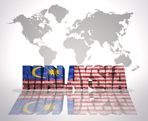 Word Malaysia on a world map background