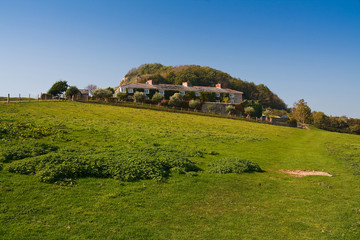 Fototapeta na wymiar House in the countryside on the coast of Devon, UK.
