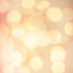 Gold Festive Christmas background. Abstract twinkled bright back