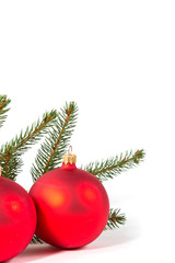 Obraz na płótnie Canvas red Christmas balls and fir branch