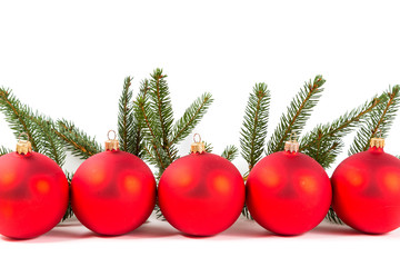 red Christmas balls and fir branch