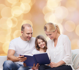 happy family with book at home