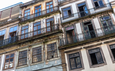 Fototapeta na wymiar Typical portuguese ruined buildings in downtown Porto