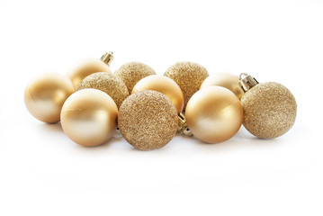 Gold Christmas ball decorations on white background