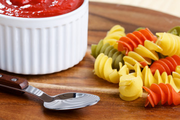 Tomato sauce with italian pasta and spoon