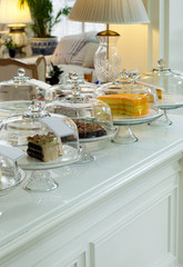 Display of cakes in vintage cafeteria